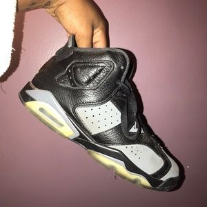 BLACK AND GREY JORDANS.